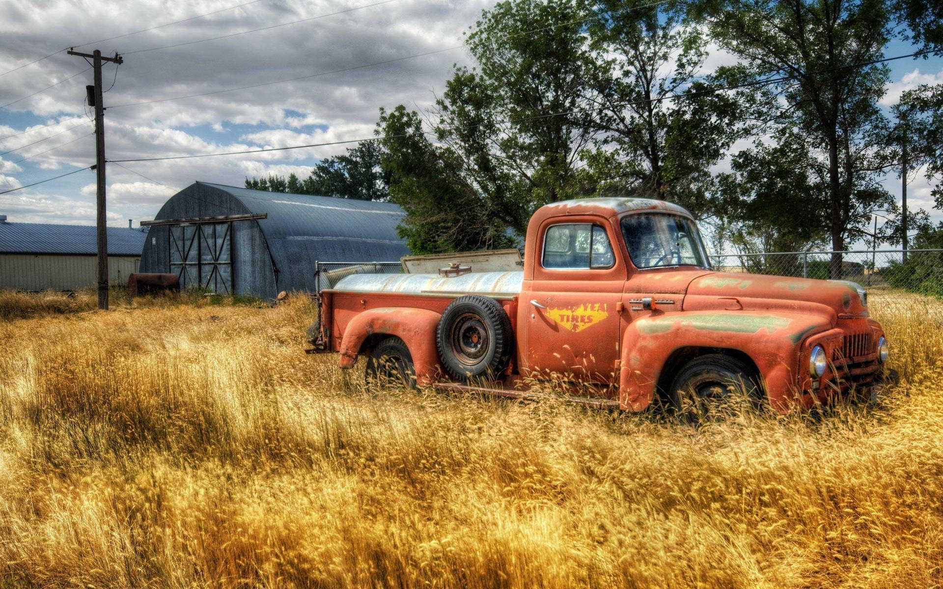 Old Ford Truck On Grass Field Wallpaper
