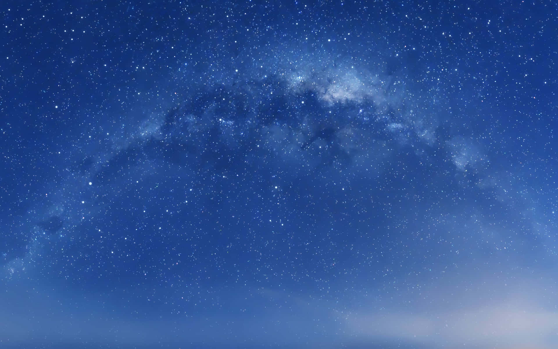 En stjernefuld himmel med mælkehvide og blinkende stjerner Wallpaper