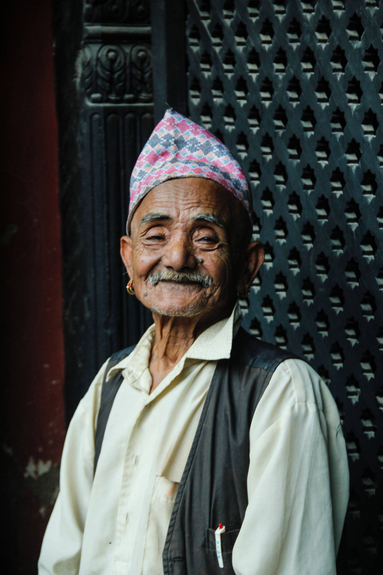 Elderly Man Rejoicing in Traditional Keffiyeh Head Scarf Wallpaper