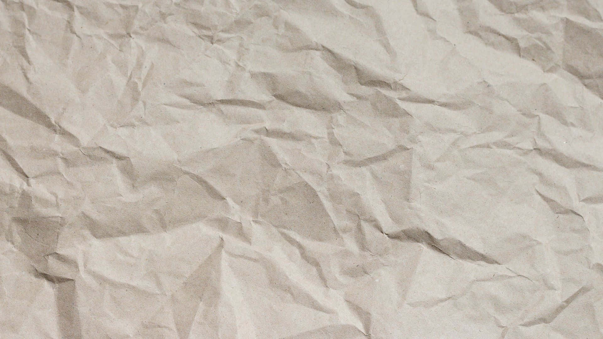 A Close Up Of A Crumpled Paper