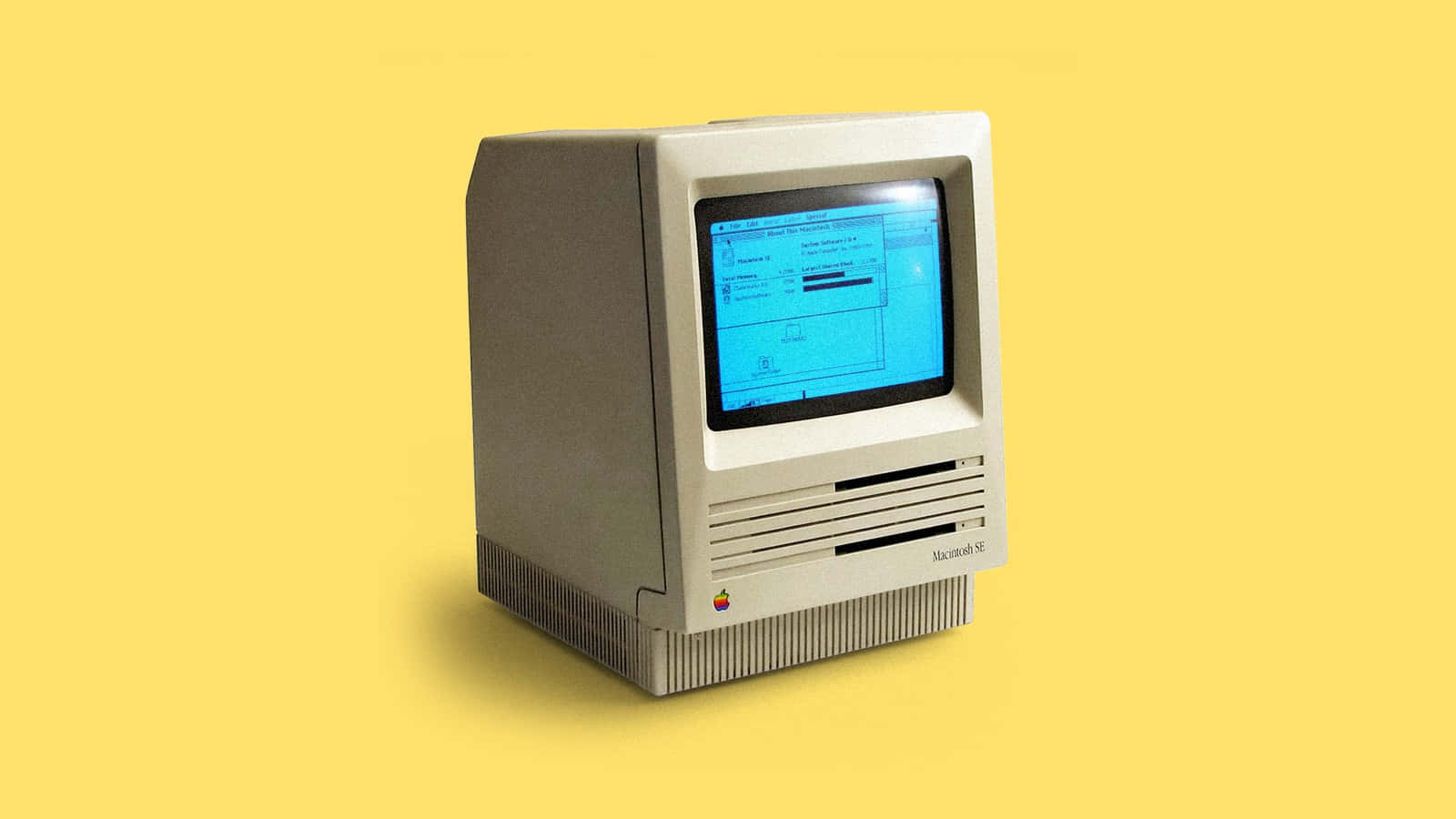 An old computer retrospectively placed in a modern setting Wallpaper