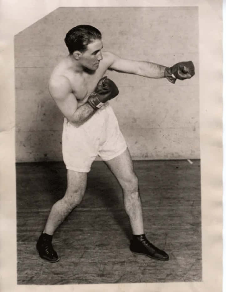Old Photo Of Johnny Dundee Doing A Boxing Stance Wallpaper