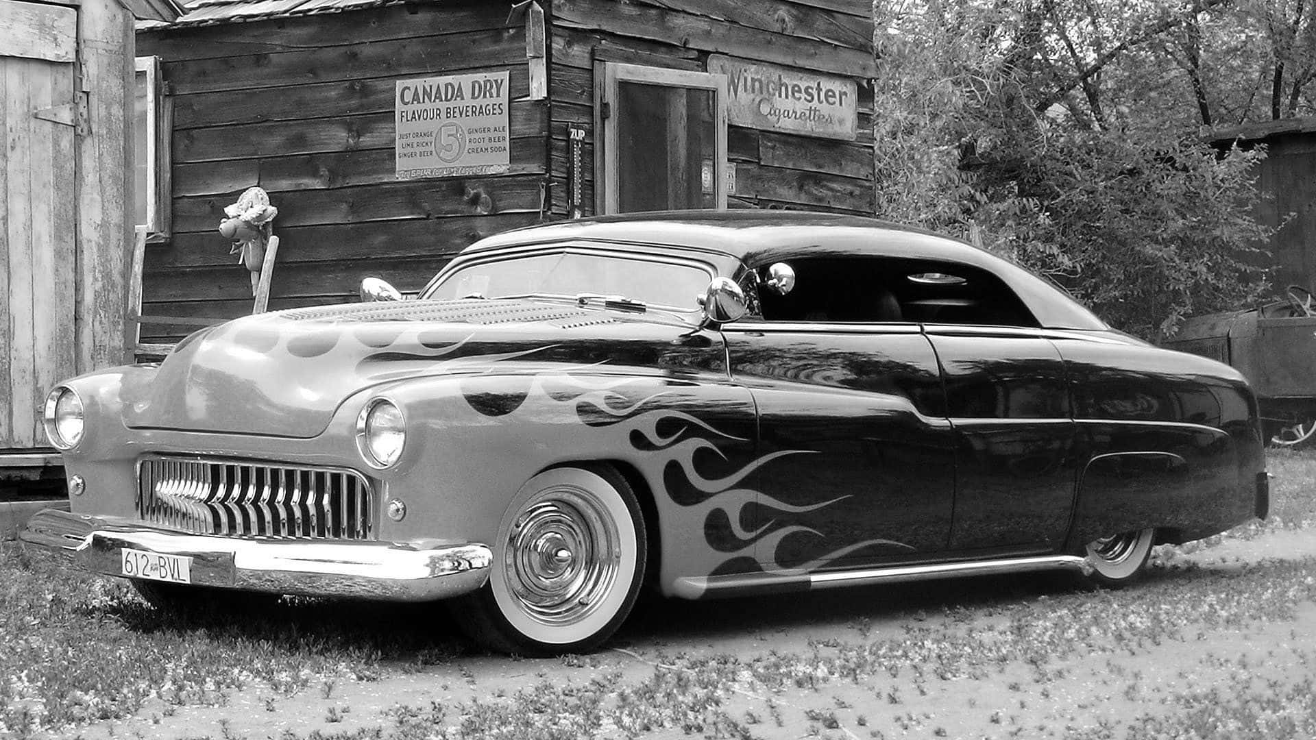 En sort og hvid foto af et klassisk bil Wallpaper