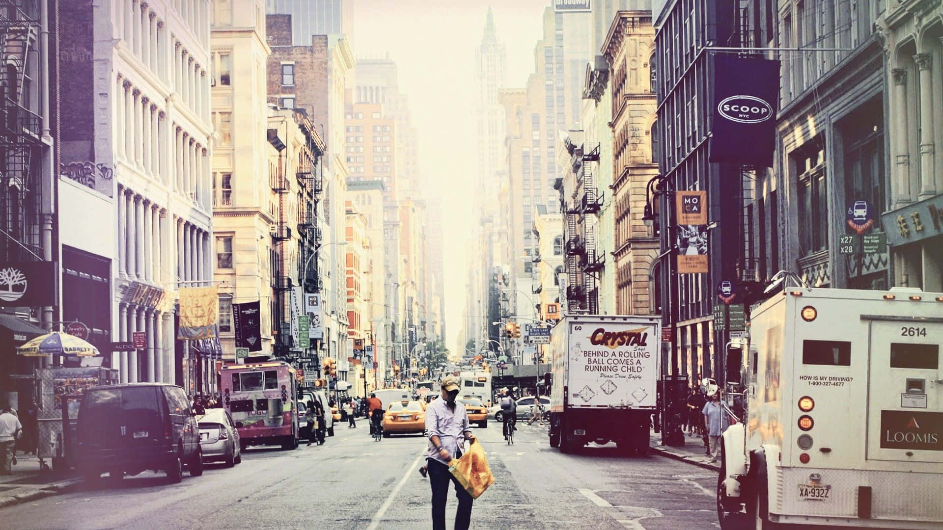A Person Walking Down A City Street