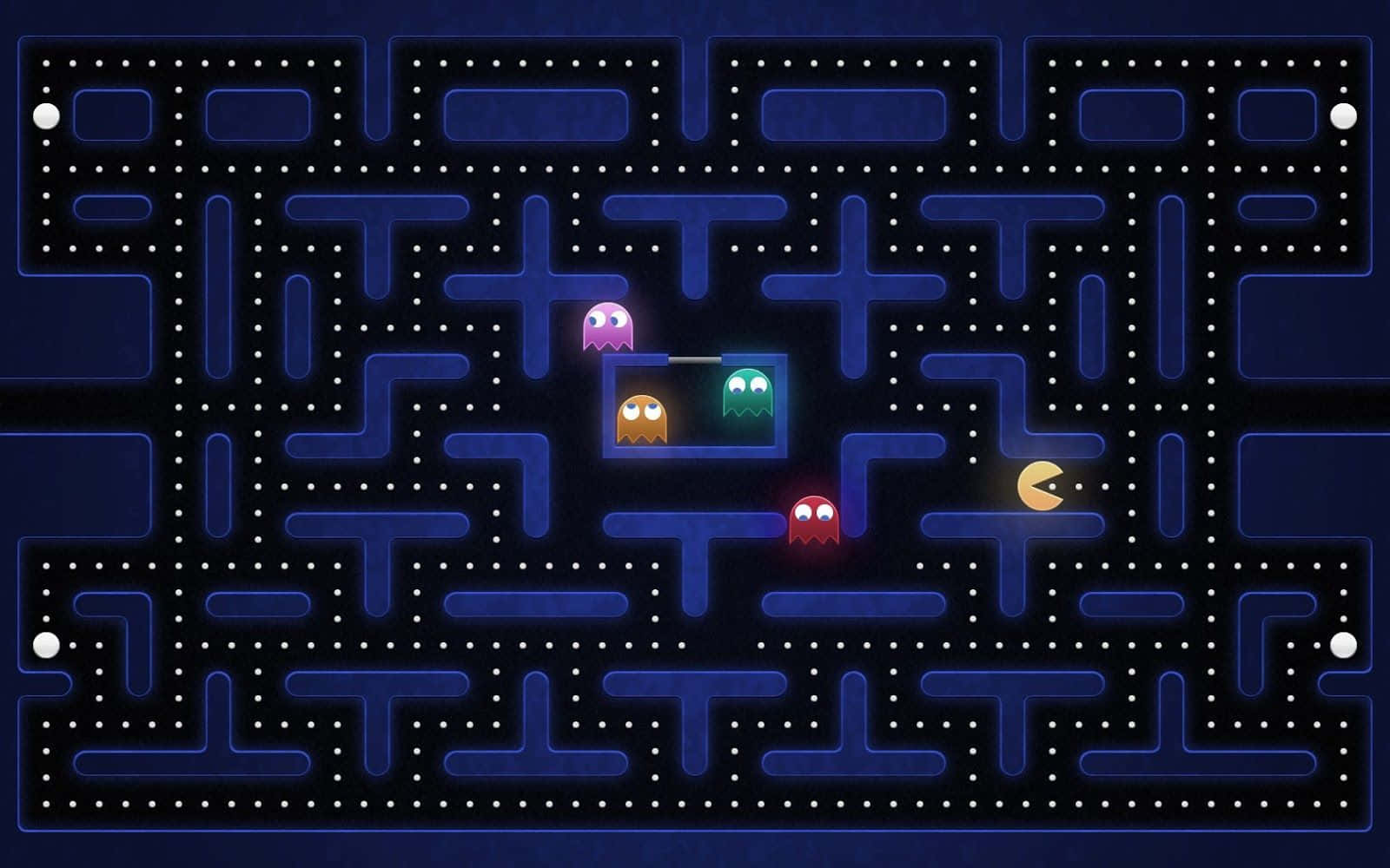 Pac-Man spil med en blå baggrund Wallpaper