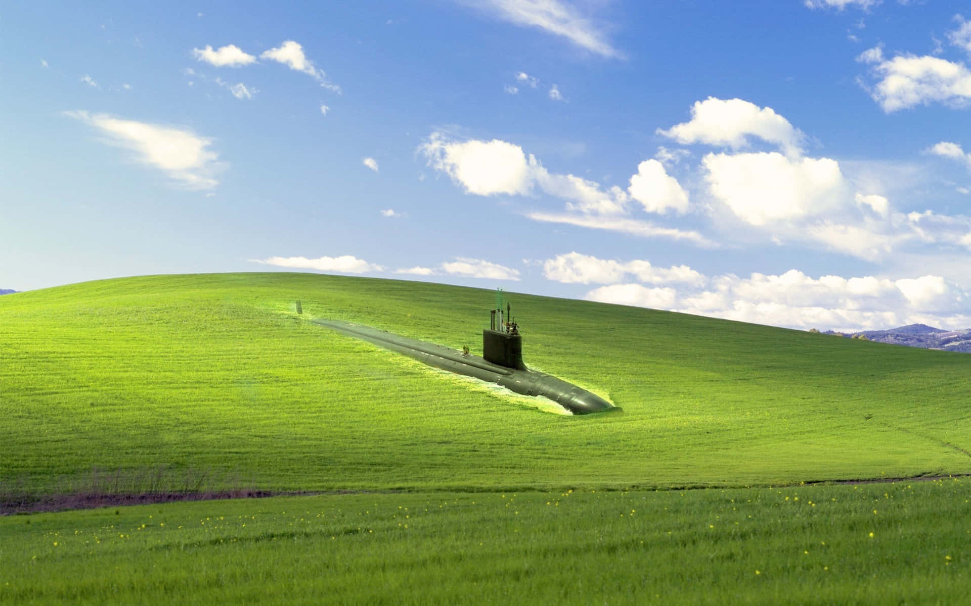 A Green Field With A Submarine