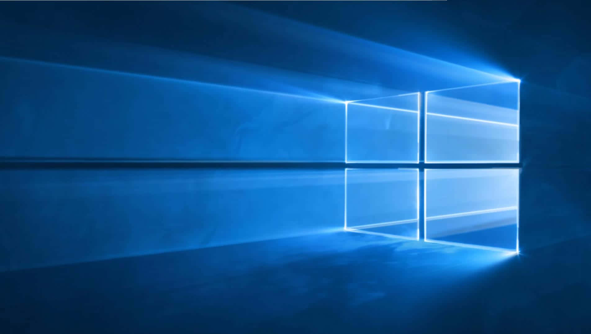 Windows 10 logo med en blå baggrund Wallpaper