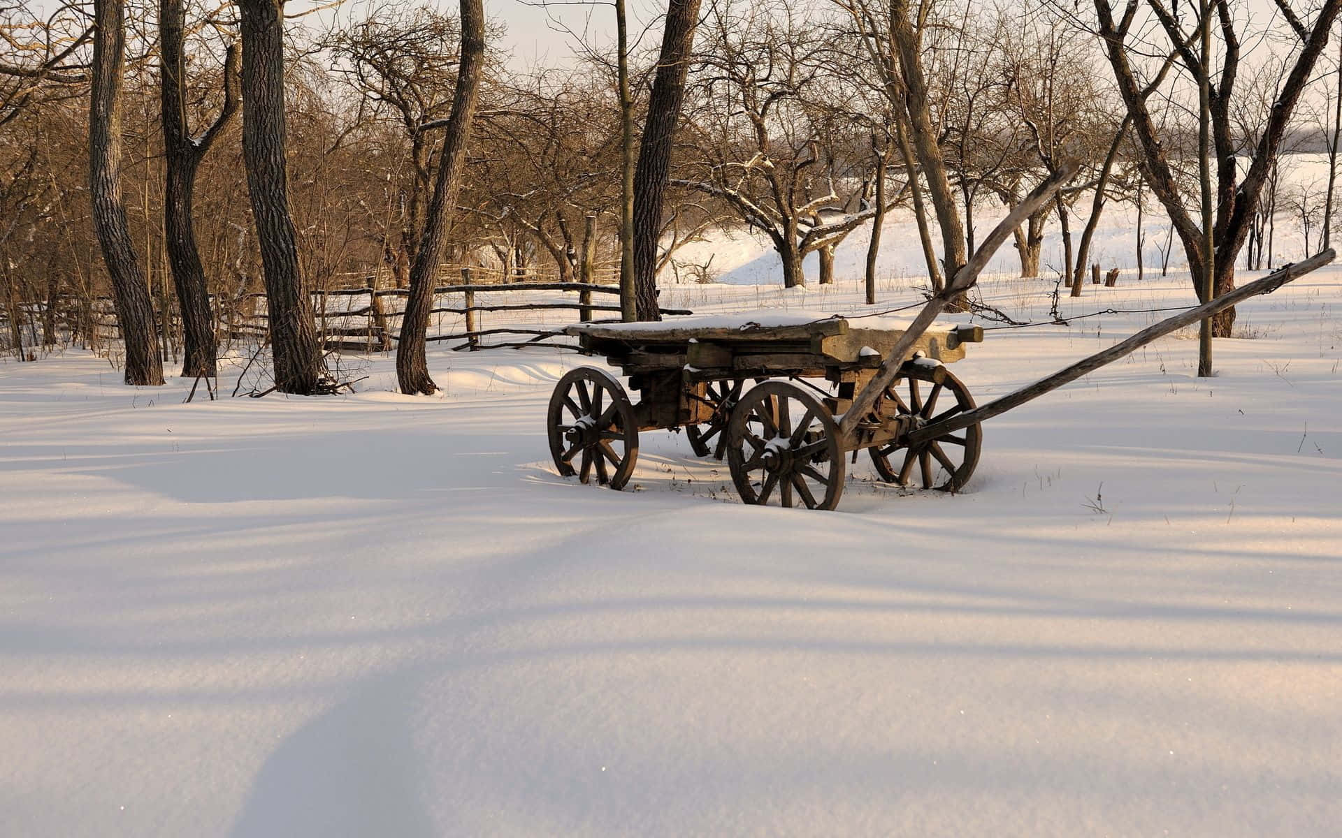 A Wooden Wagon In The Snow Wallpaper