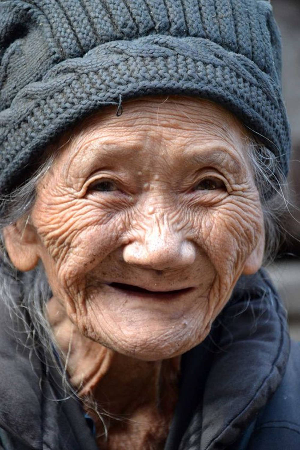 Old Woman With Knitted Bonnet Wallpaper