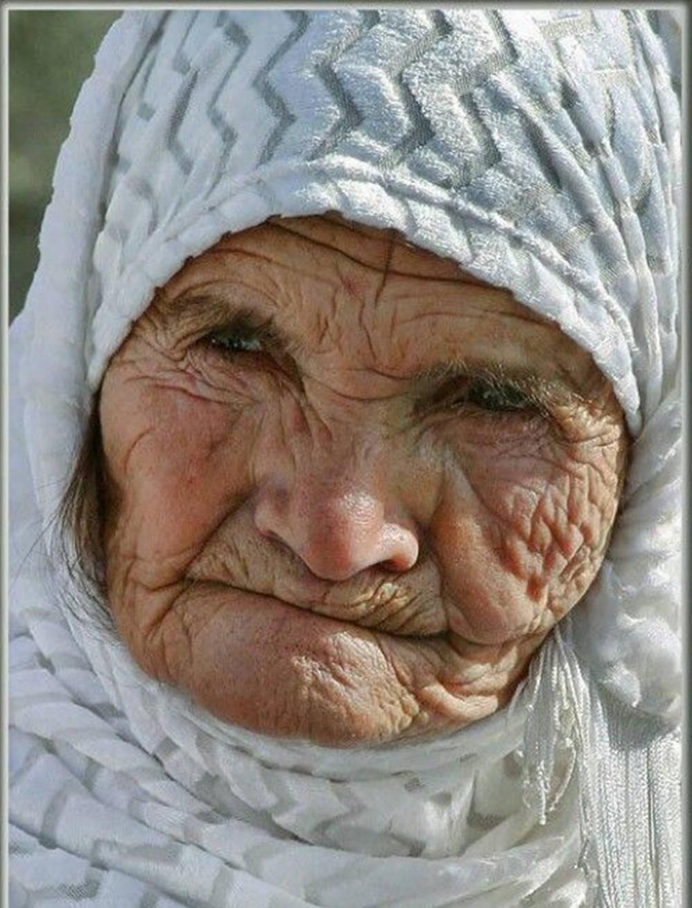 Old Woman With White Headwrap Wallpaper