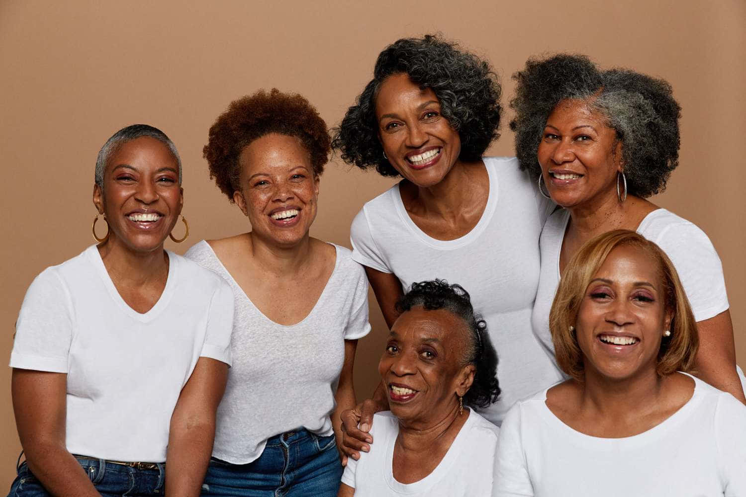 Older Black Woman State Of Skin Study Wallpaper