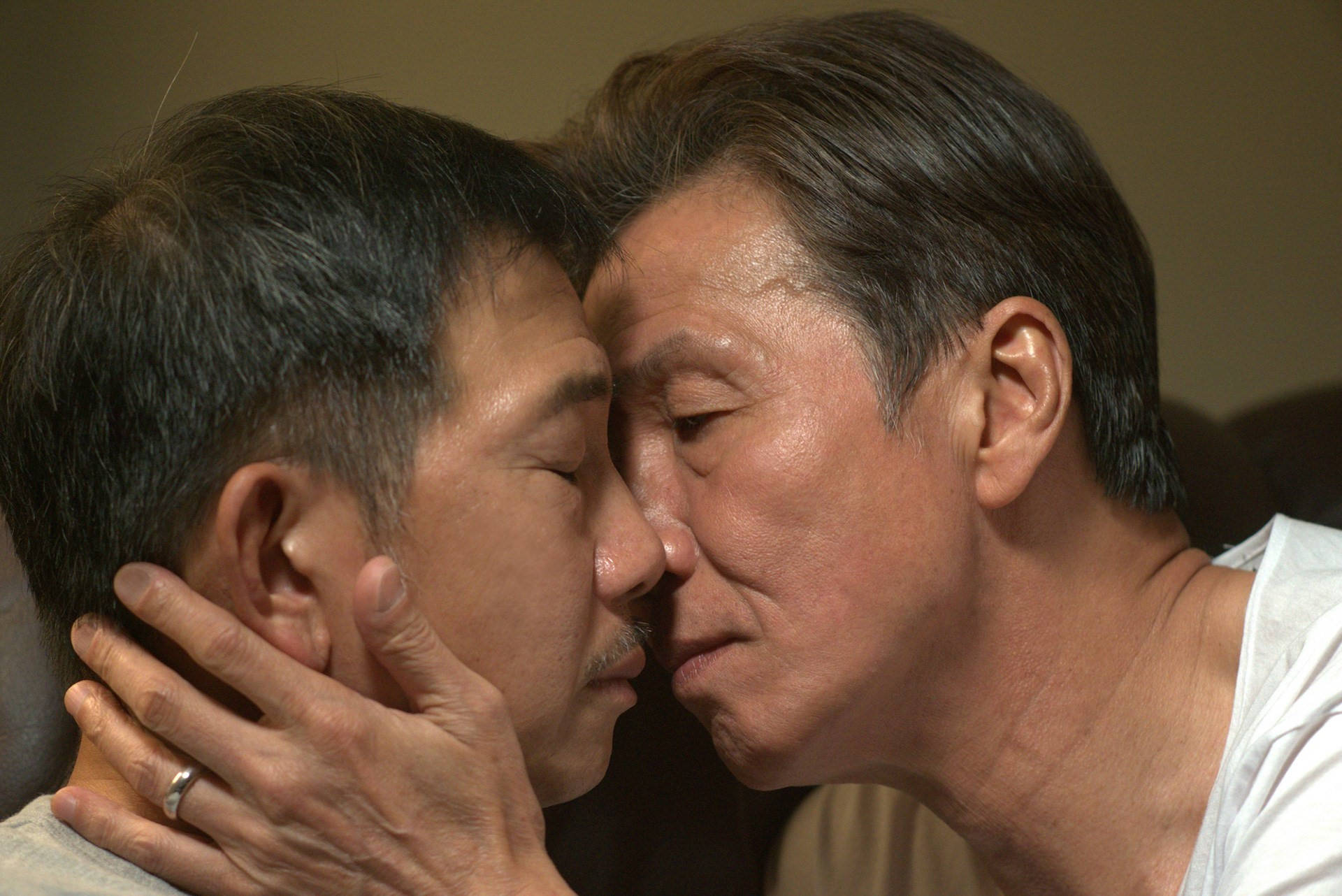 Older Gay Men Kiss Background