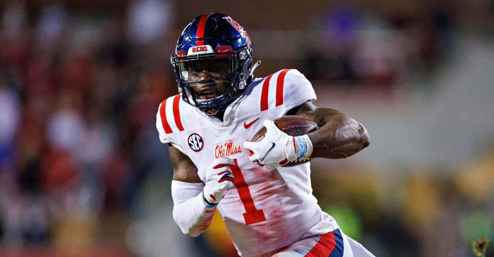 Ole Miss_ Football_ Player_ Action_ Shot Wallpaper