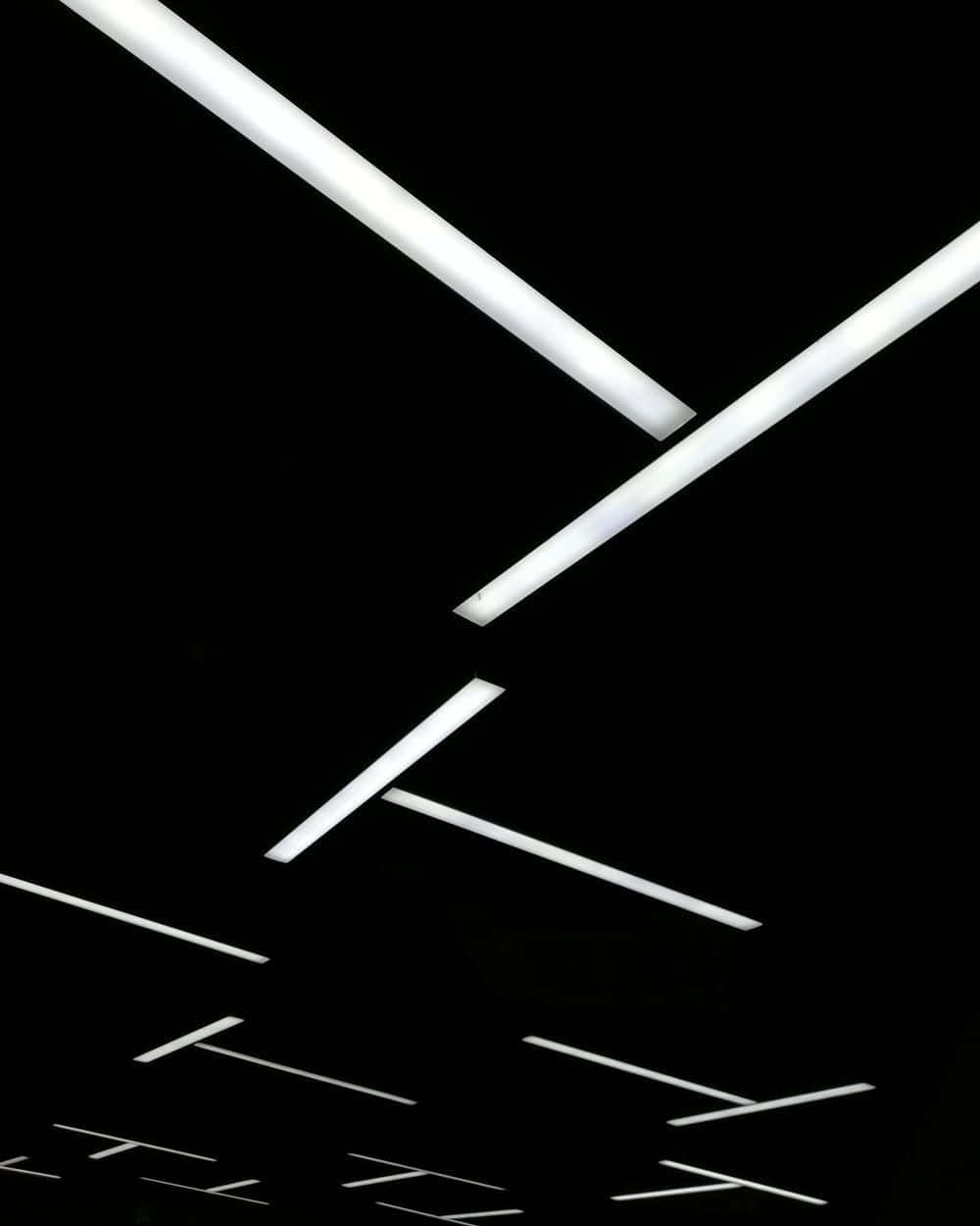 A White Ceiling With White Lines On It