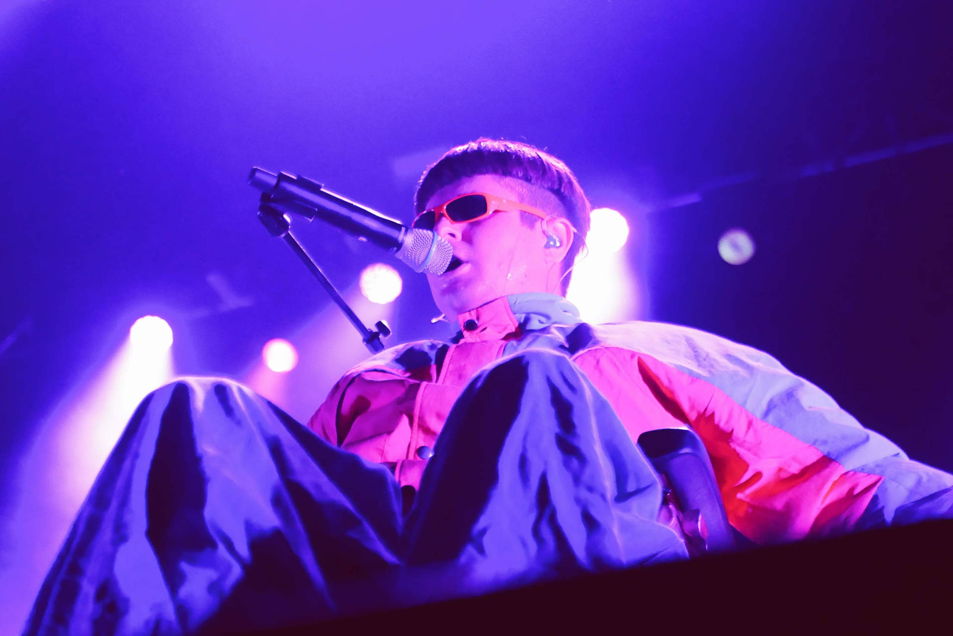 Oliver Tree Performing On Stage Wallpaper