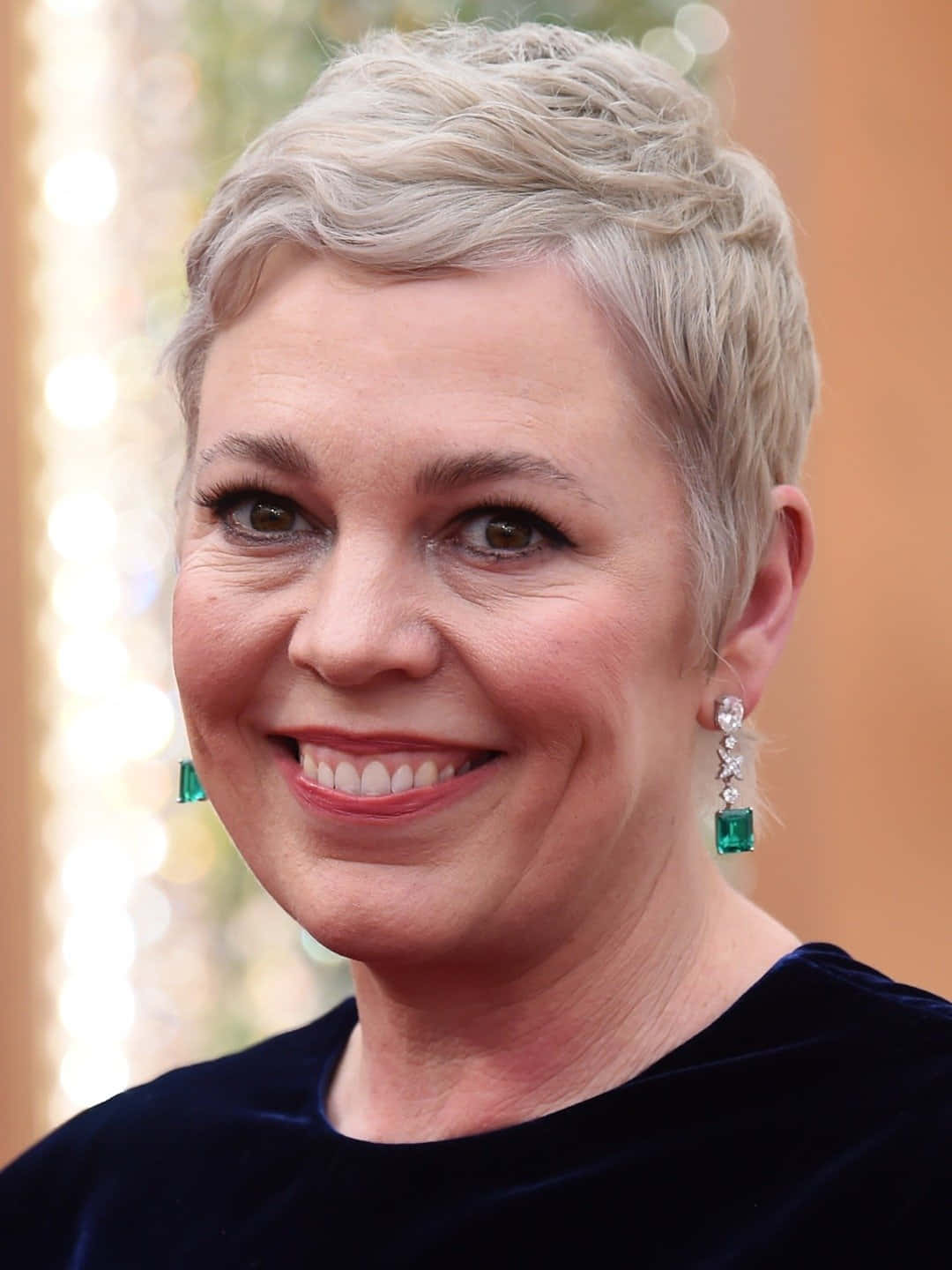 Olivia Colman Glowing On The Red Carpet. Wallpaper