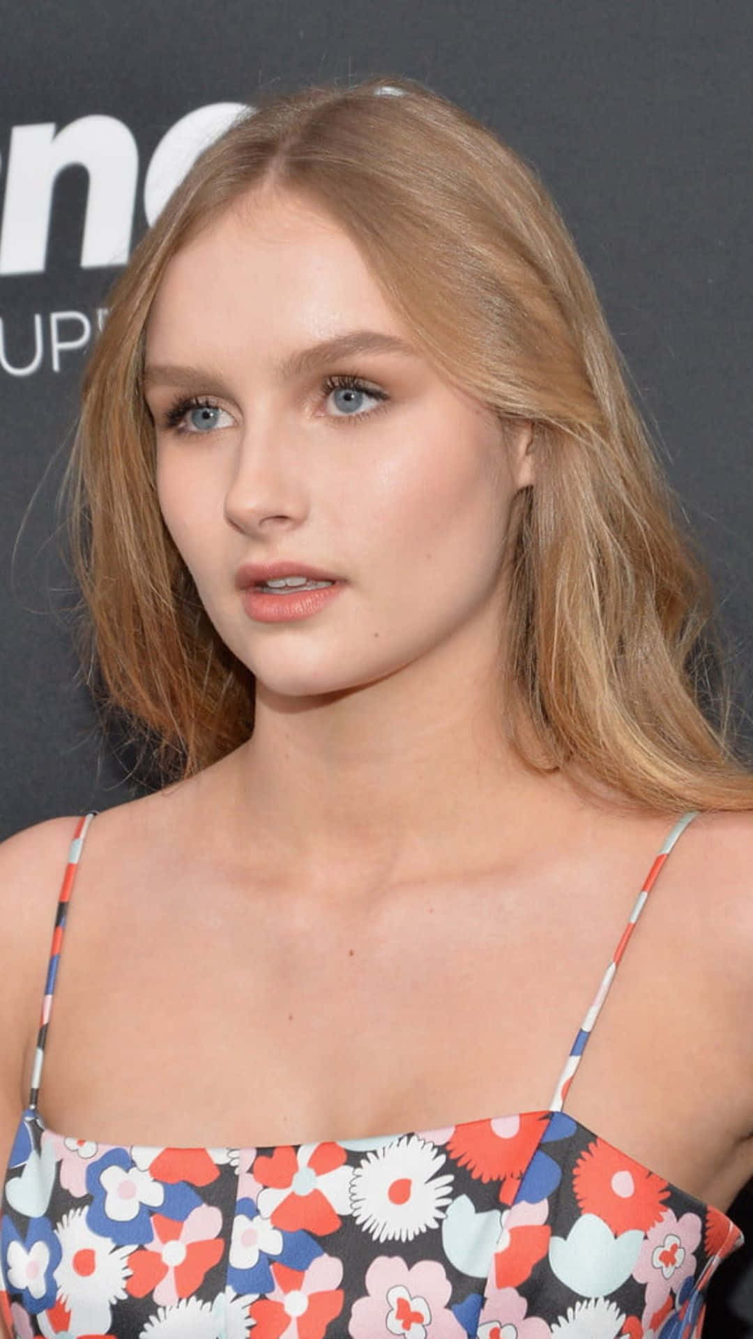 Olivia Dejonge Floral Dress Event Wallpaper