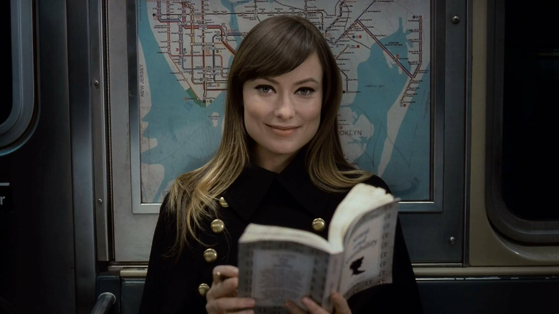 Olivia Wilde Holding A Book