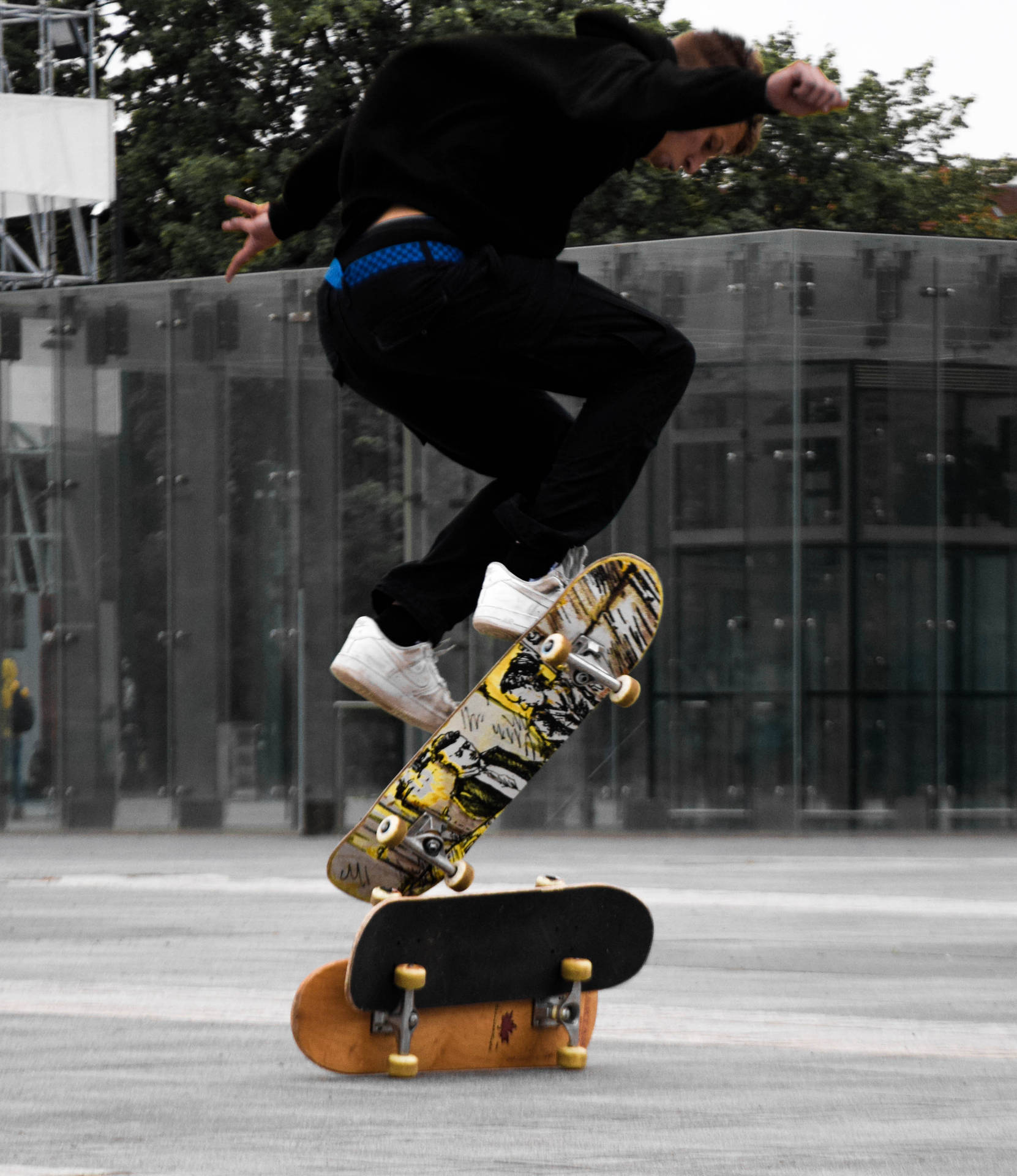 Skateboarder Mid-air Ollie Wallpaper