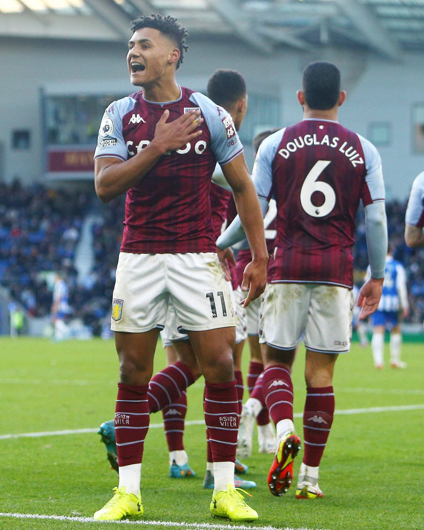 Aston Villa's star, Ollie Watkins, in an intense moment during a game. Wallpaper