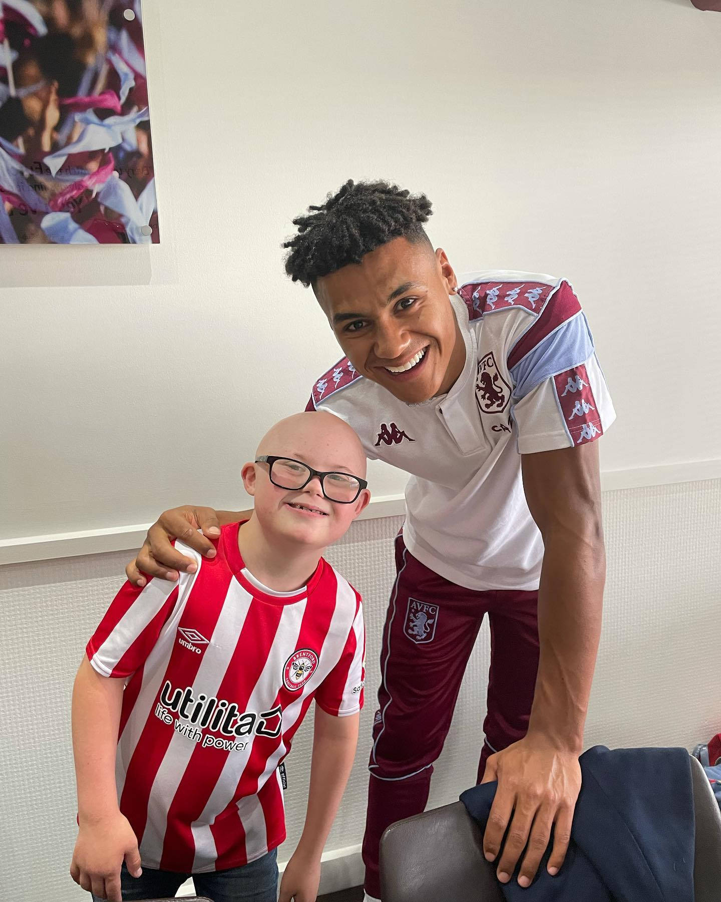 Ollie Watkins With A Young Fan Wallpaper