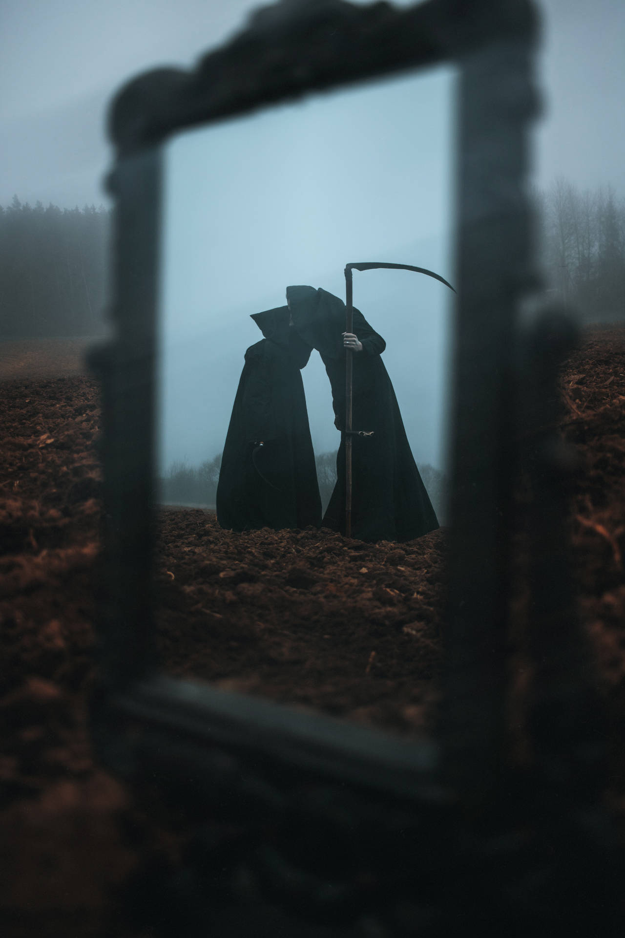 Ominous Grim Reaper In A Mirror Wallpaper