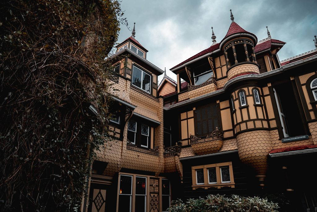 Ominous Winchester Mystery House Exterior Wallpaper
