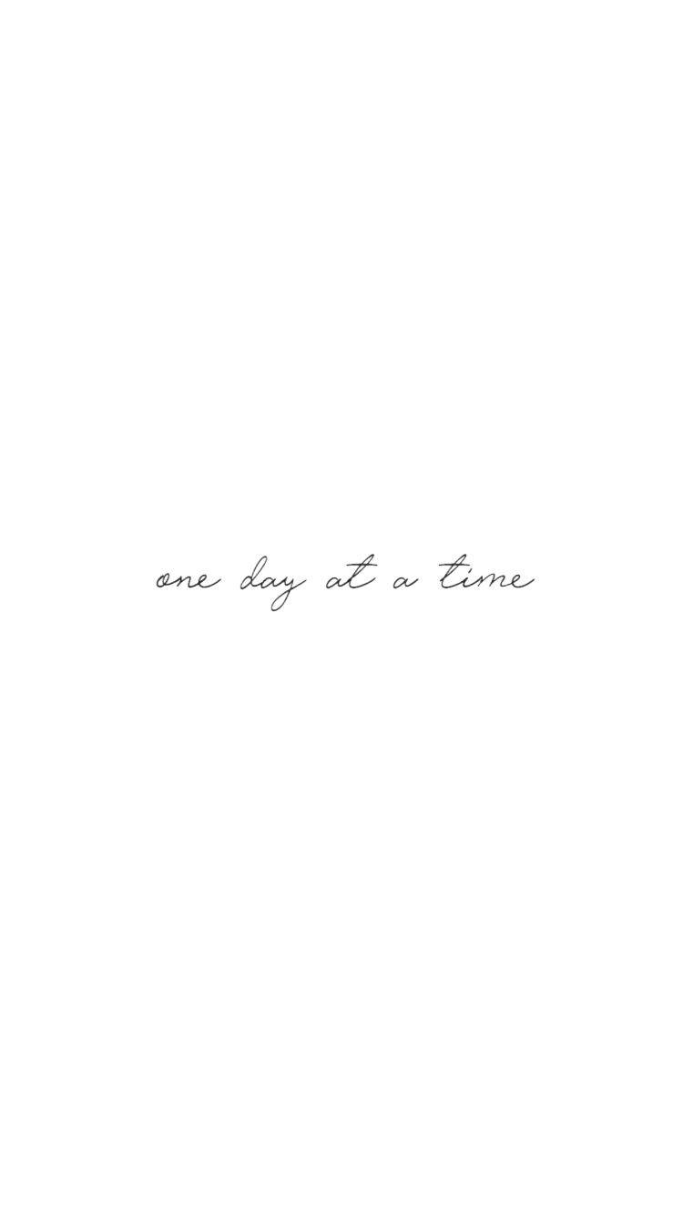 Caption: Inspiring Black and White Quote - One Day At A Time Wallpaper