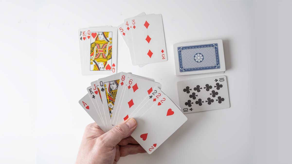 One Hand Playing Rummy Alone Wallpaper