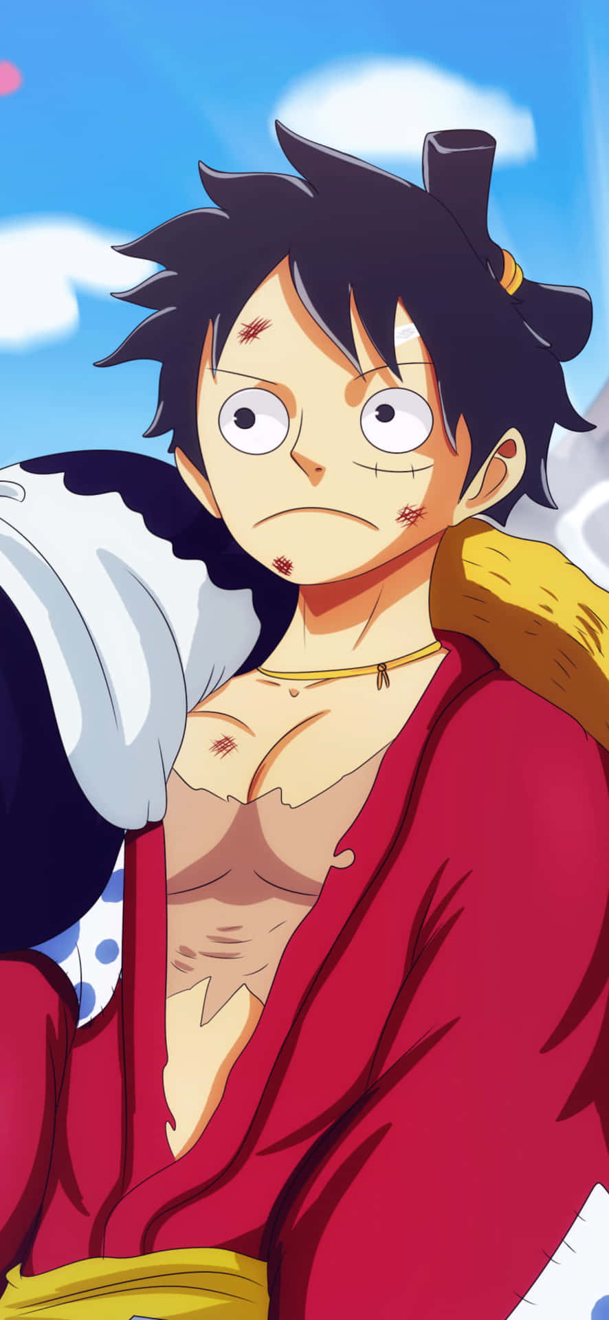 Luffy fra den vildt populære anime-serie, One Piece vises på det ikoniske iPhone. Wallpaper