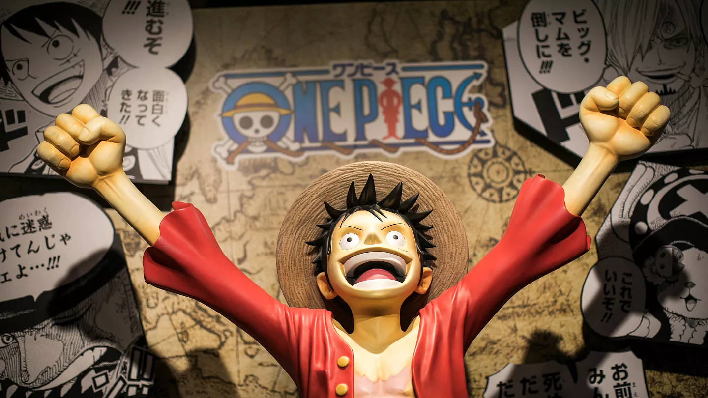 Enone Piece Luffy-leksak. In Context Of Computer Or Mobile Wallpaper, This Doesn't Make Complete Sense As It Is Describing A Physical Toy Rather Than A Wallpaper Design. A Better Translation Would Be: En One Piece Luffy Bakgrundsbild. Wallpaper