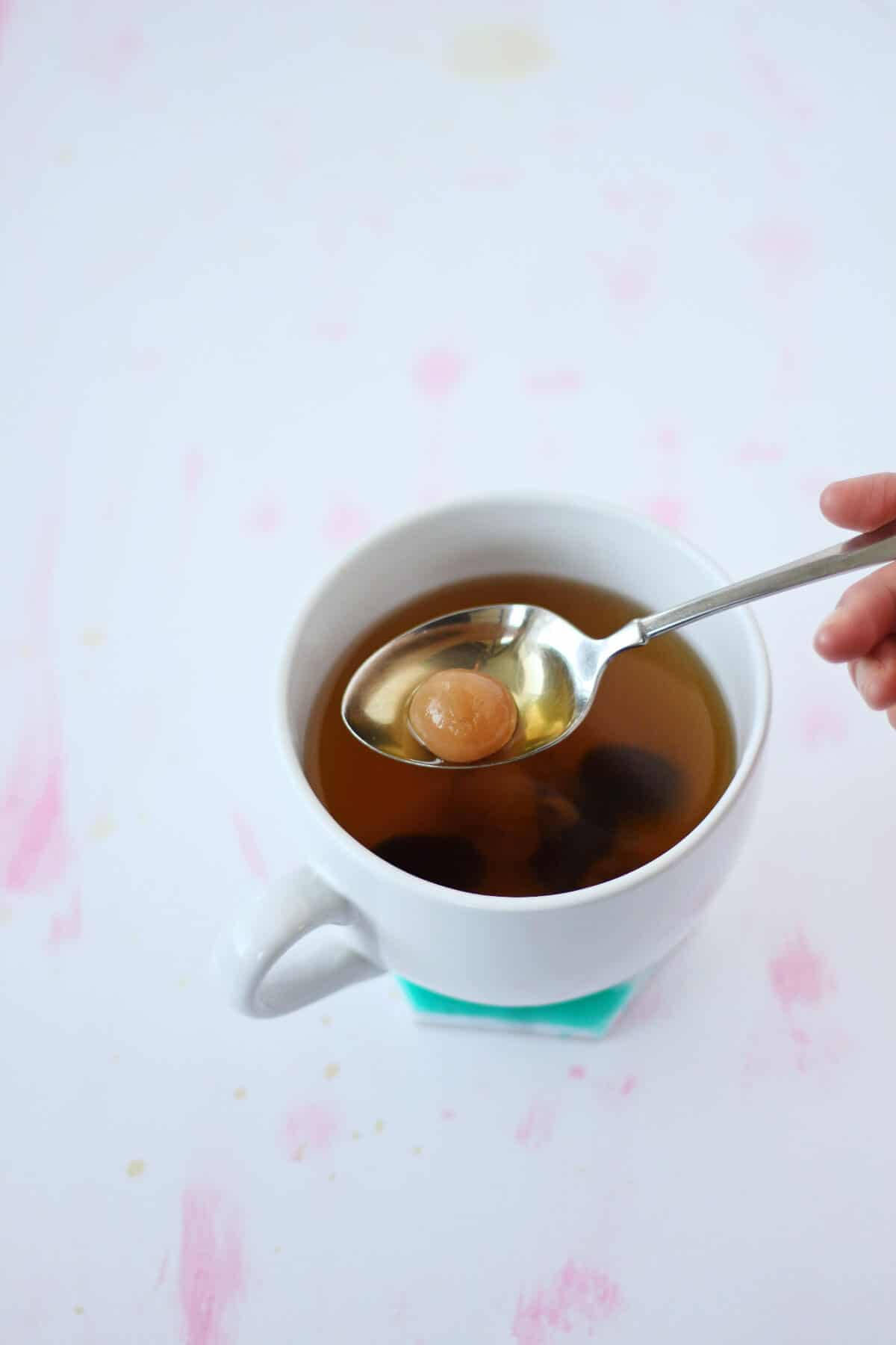 One Tea Cup Of Longan Fruit Wallpaper