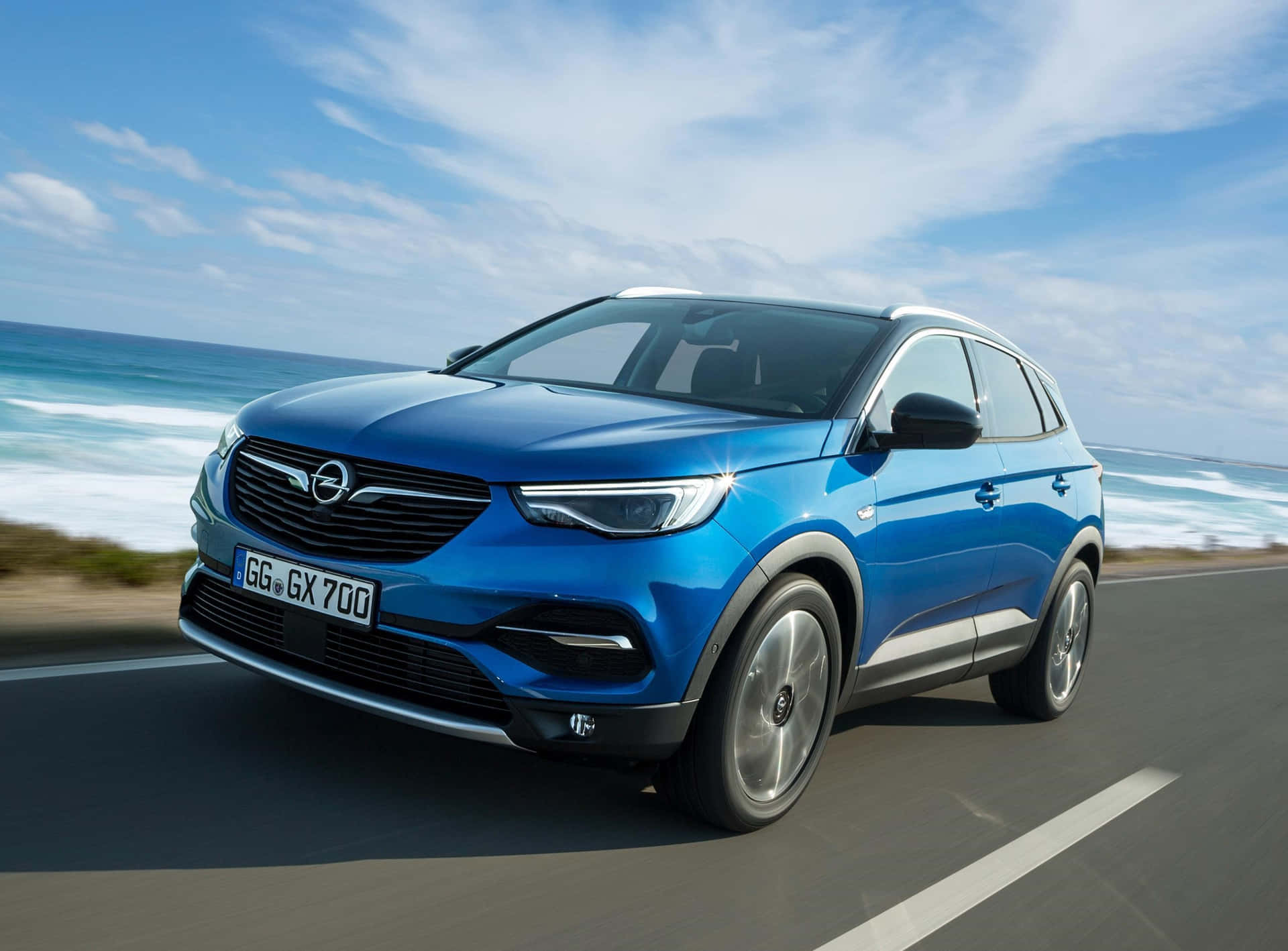 Download Sleek and Stylish Opel Grandland X in a Scenic Landscape