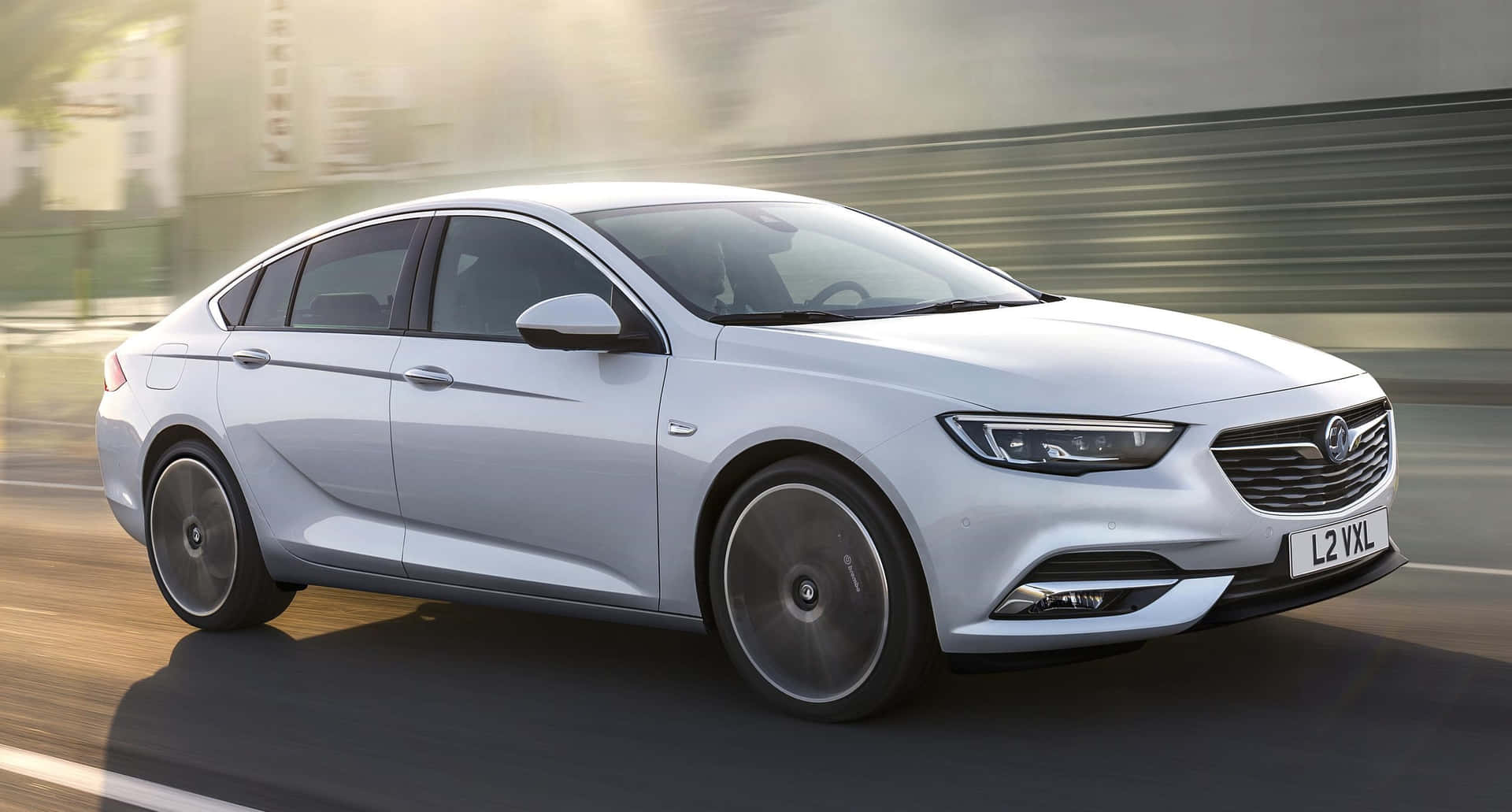 Sleek and Stylish Opel Insignia in Motion Wallpaper