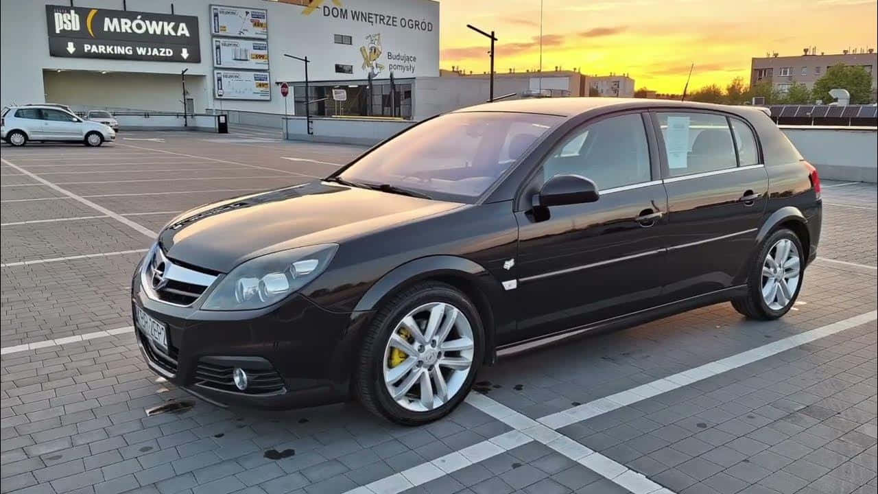 Opel Signum Garée Au Coucher De Soleil Fond d'écran