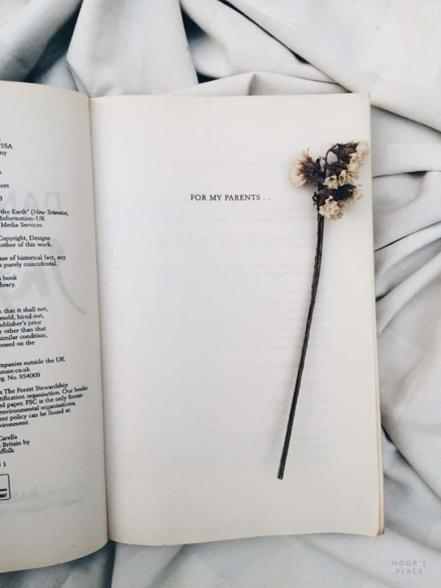 A Book With A Flower On It