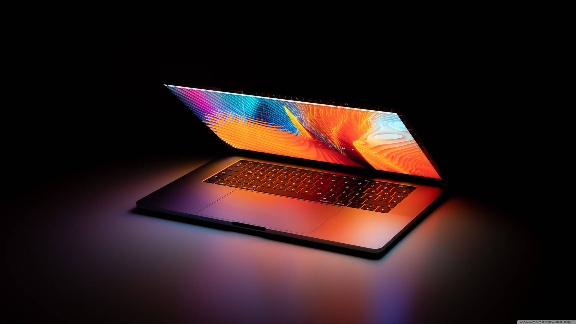 Open Laptop In Dark Wallpaper