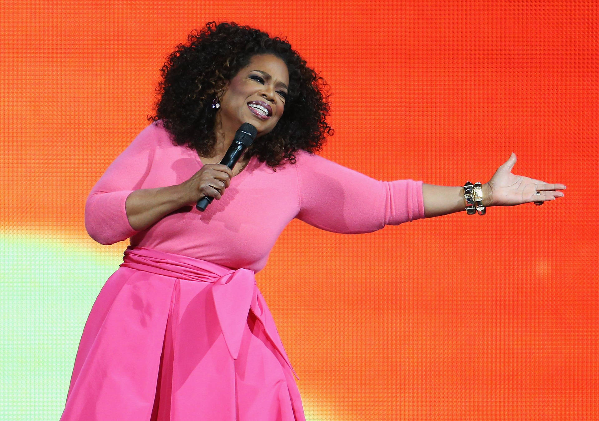 Oprah Winfrey In Pink Dress Background
