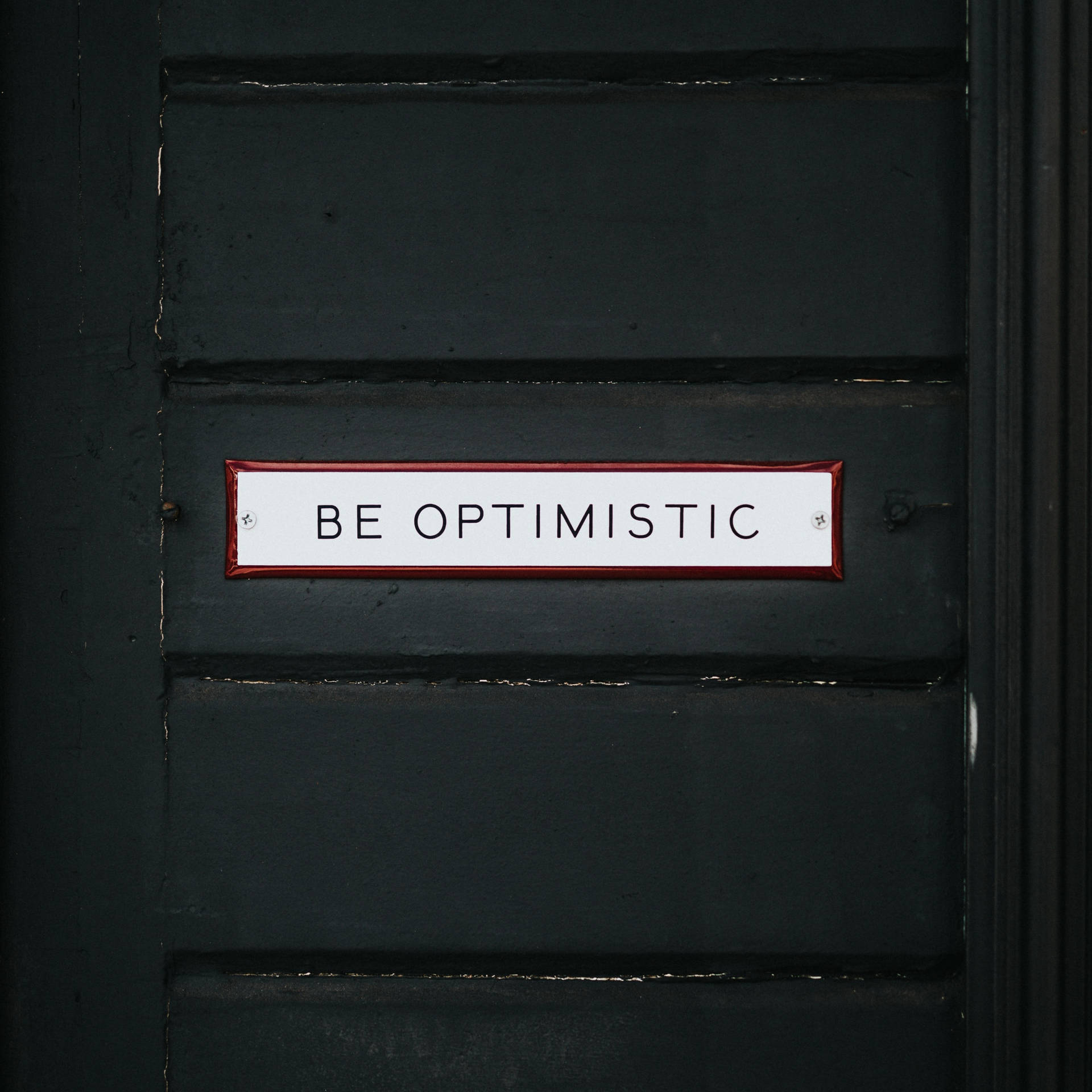 Optimistic Door Sign Wallpaper