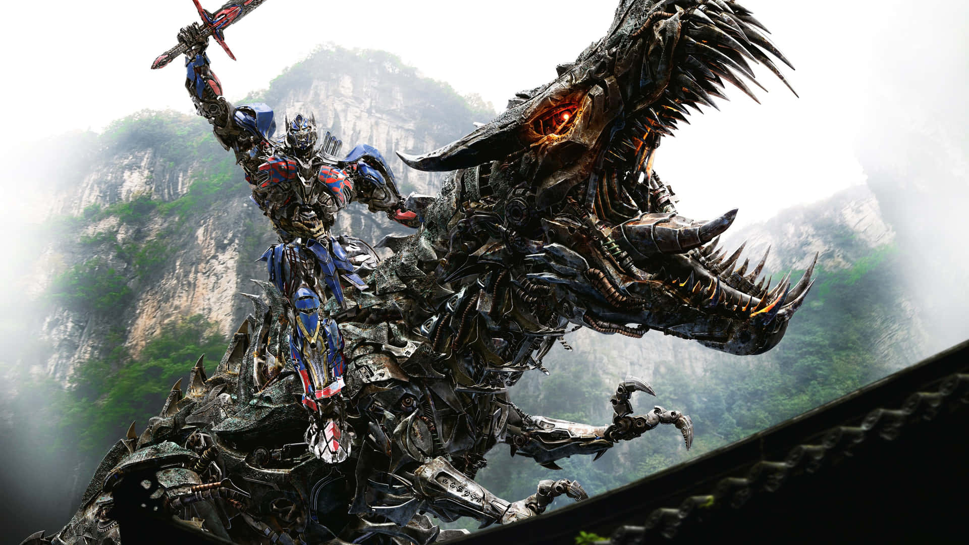 Optimus Prime stands tall among the Autobots Wallpaper