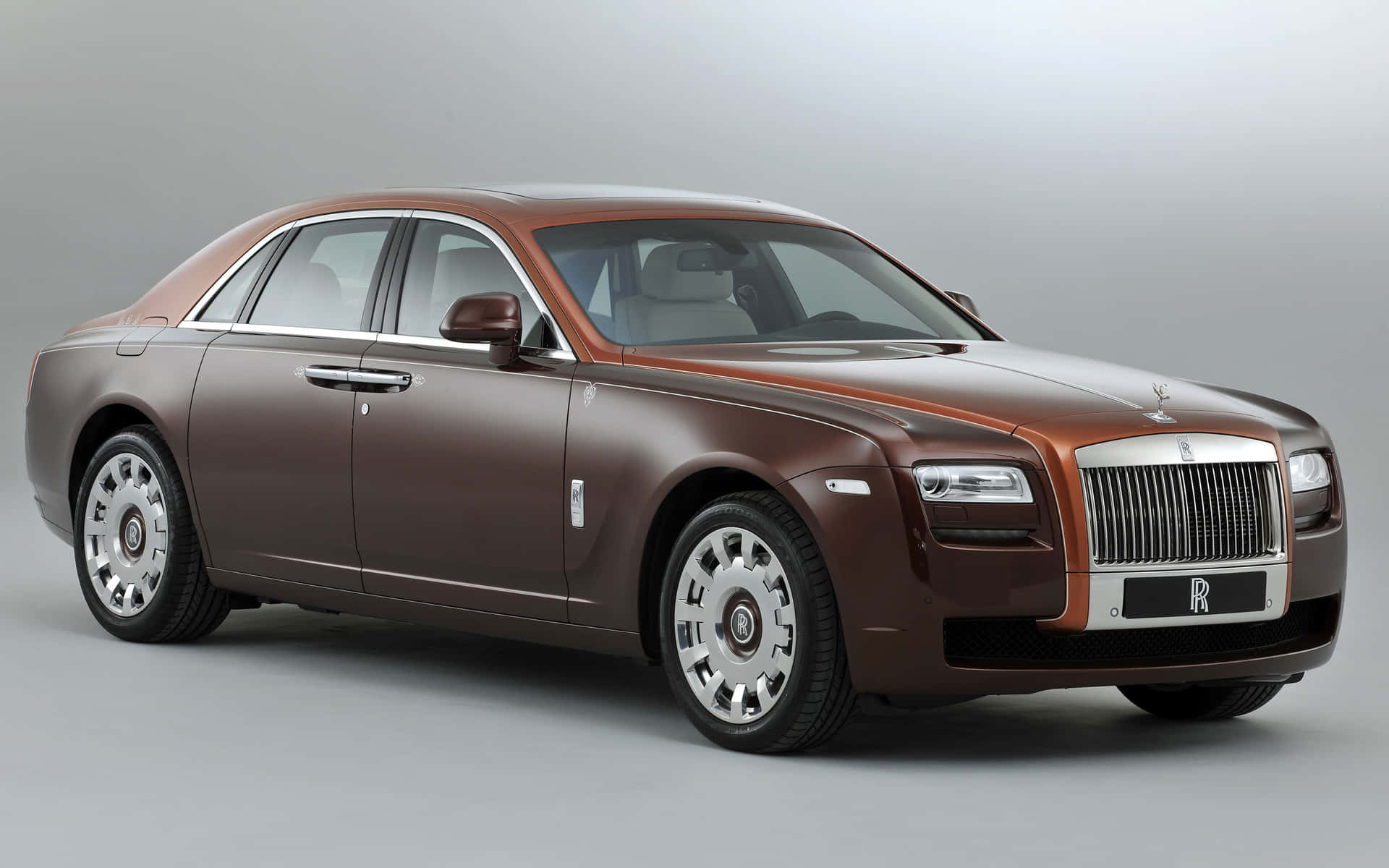 Opulence Meets Performance - The Majestic Rolls Royce Ghost Wallpaper