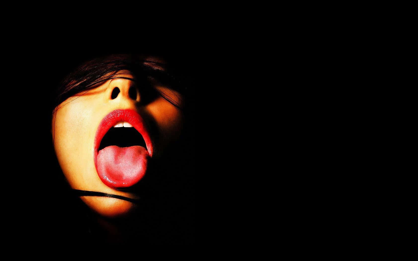 Oral Tongue Out Wallpaper