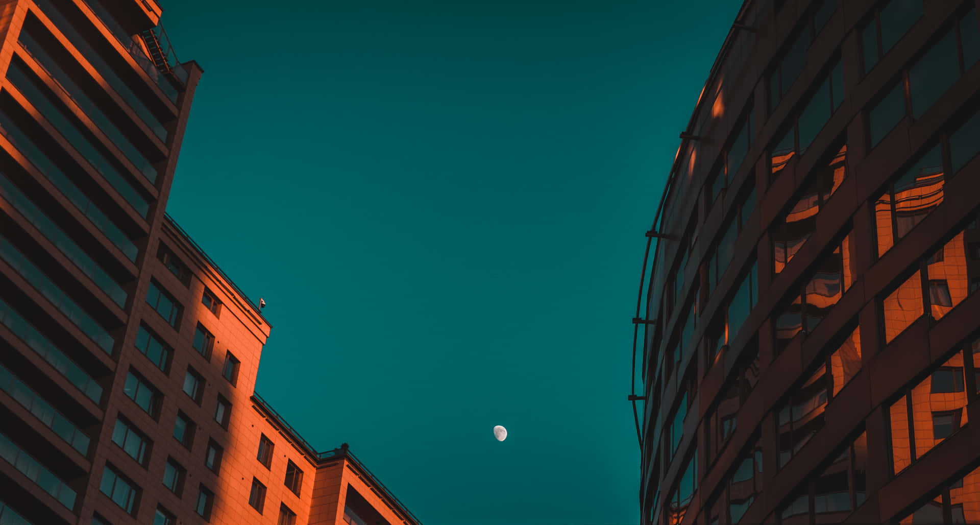 Orange And Teal City Buildings View Wallpaper