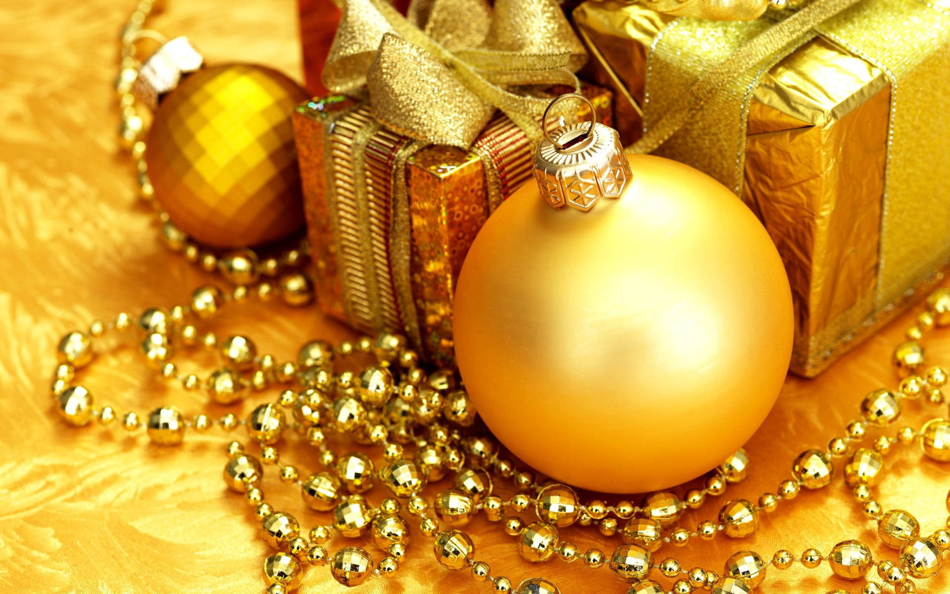 Orange Christmas Balls With Gifts Wallpaper