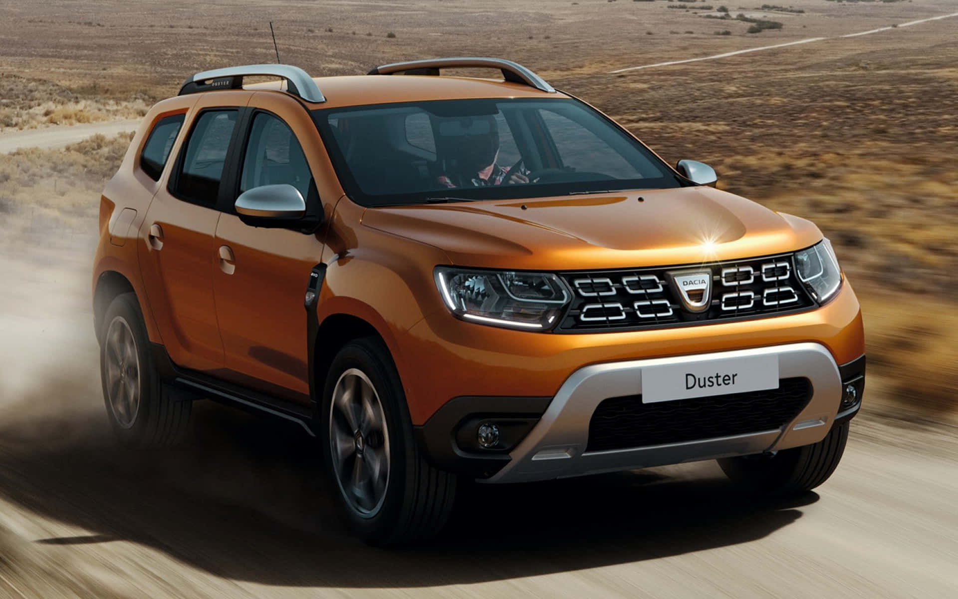 Oranje Dacia Duster Off Road Actie Achtergrond