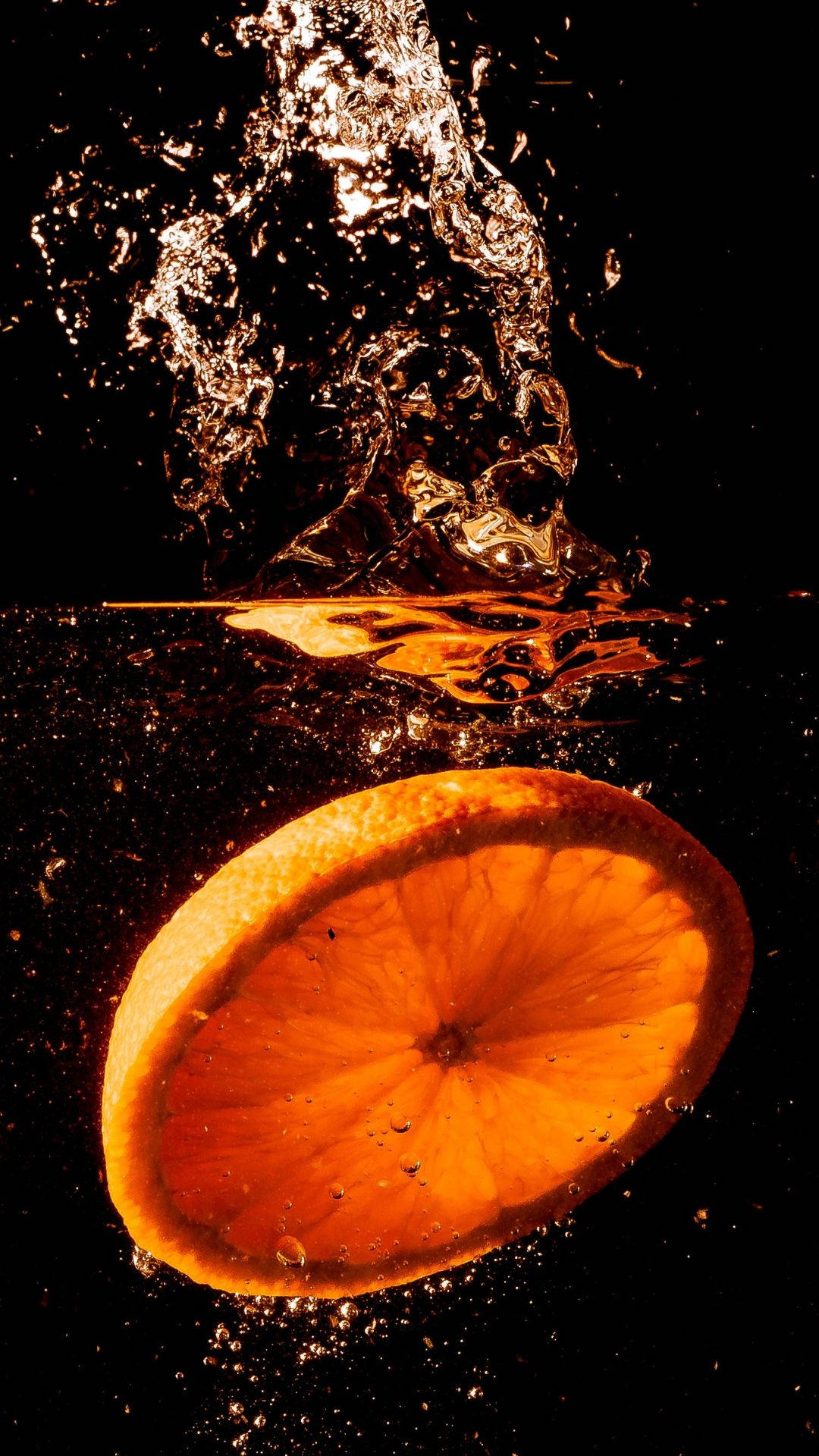Orange Fruit Dropped In Water