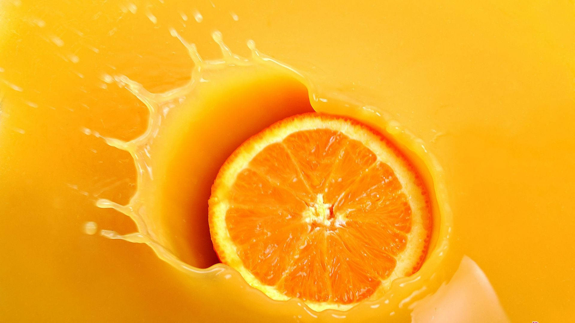 Download Orange Fruit Dunked In Juice Wallpaper 