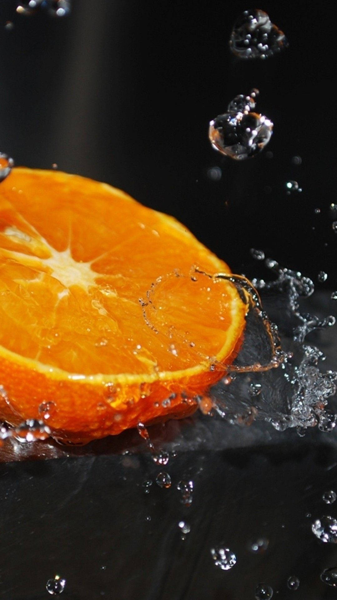 Orange Fruit With Water Splashes