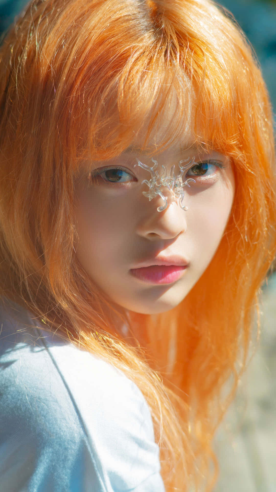 Orange Haired Personwith Face Jewelry Wallpaper