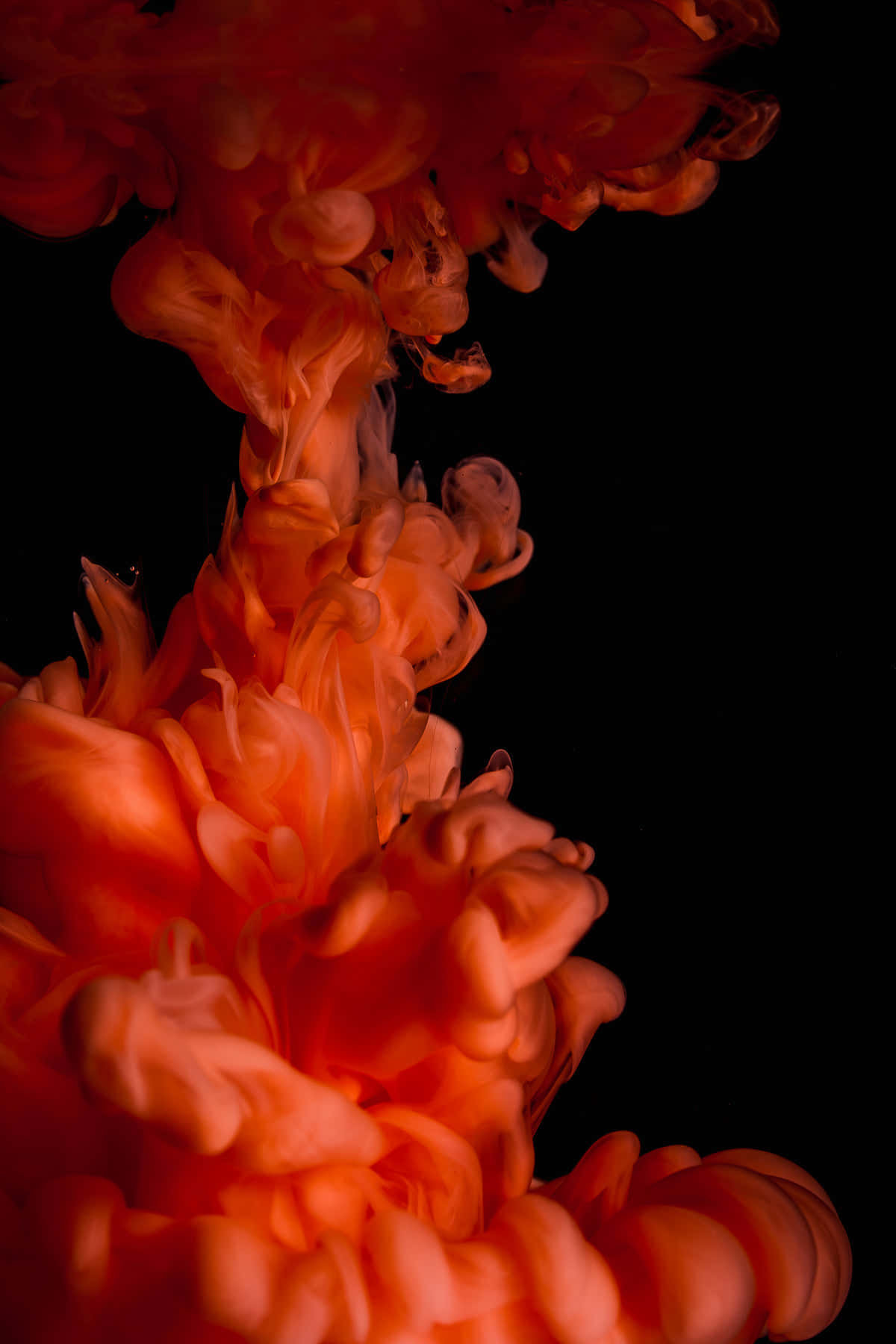 A Red Liquid Is Floating In A Black Background Wallpaper